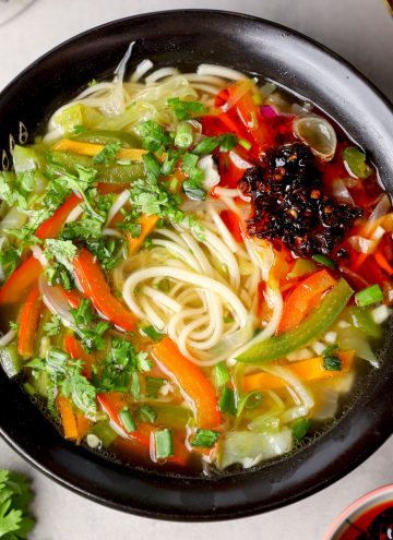 aerial shot of thukpa in a black bowl