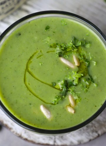 aerial shot of immunity boosting green soup in a mug
