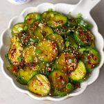 aerial shot of Korean cucumber salad in a white platter.