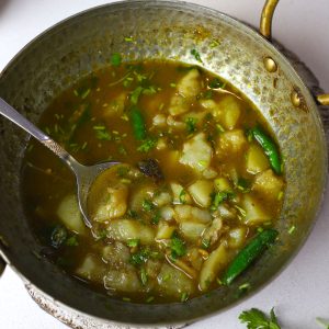 aerial shot of aloo paani in a kadhai