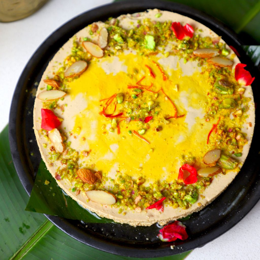 aerial shot of bhapa doi served in a black platter