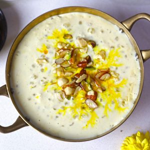 aerial shot of sabudana kheer served in a golden bowl