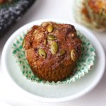 side close up shot of banana muffin in a white platter.