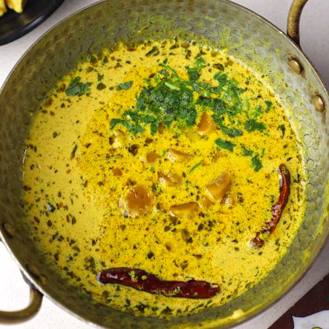 aerial shot of gatte ki sabzi in a kadhai - 9