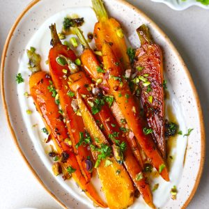 aerial shot of balsamic roasted carrots served with Greek yogurt