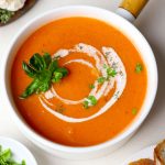 aerial shot of roasted tomato soup served in a pan. - 10