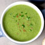 aerial shot of mushroom spinach soup in a bowl. - 9