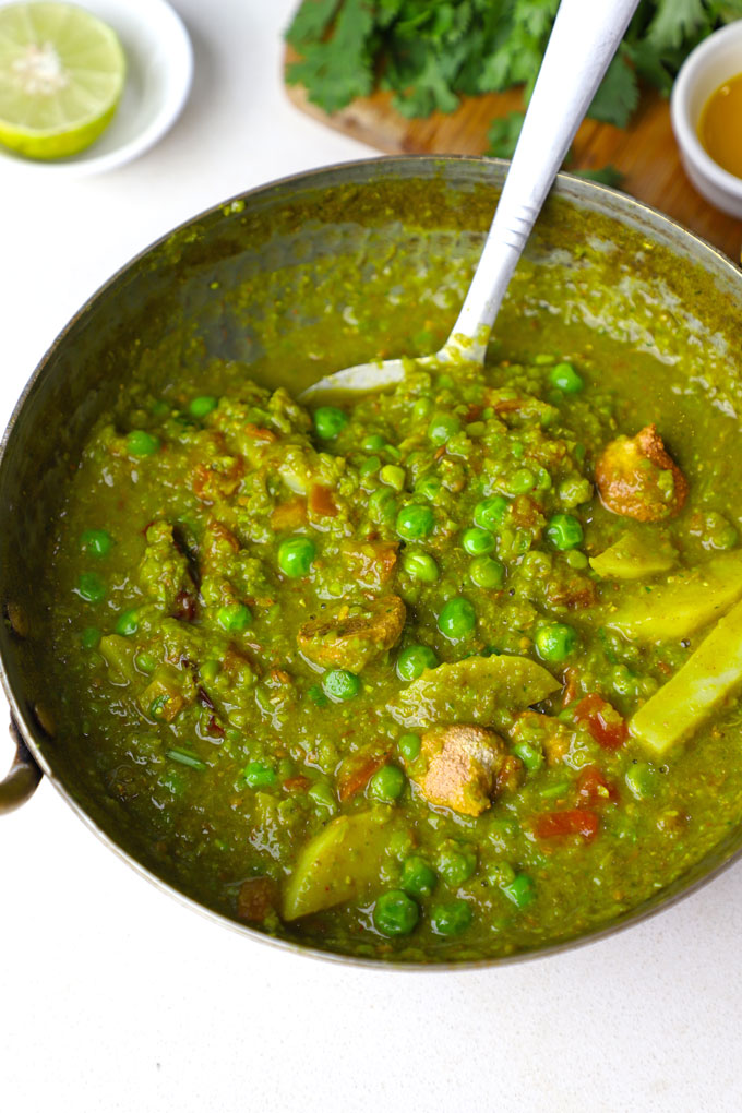 side close up shot of matar nimona in a kadhai.