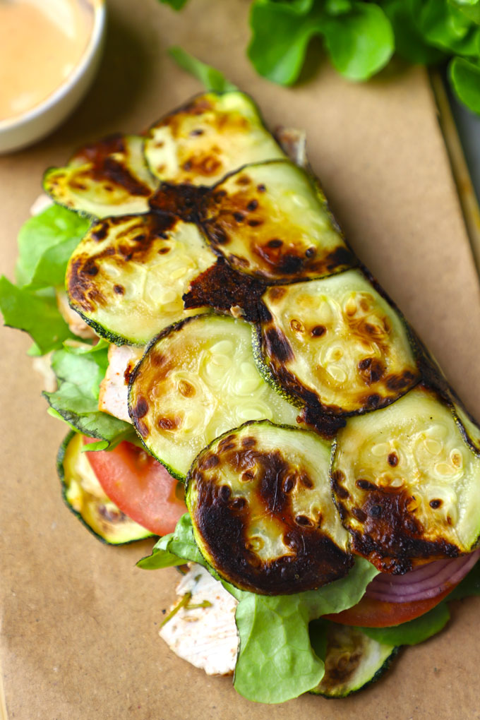 side close up shot of zucchini wrap on a platter. - 1