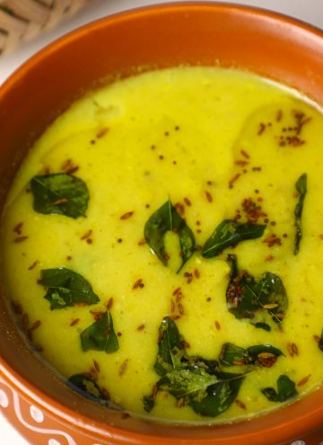 side close up shot of karichi kadhi in a clay pot.