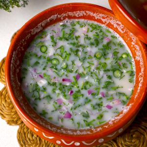 aerial shot of ragi ambli in a clay pot.