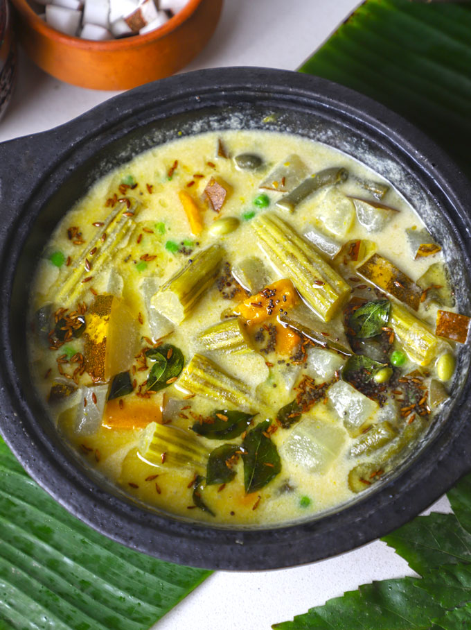 side close up shot of Karwar style Valval served in a black kadhai.