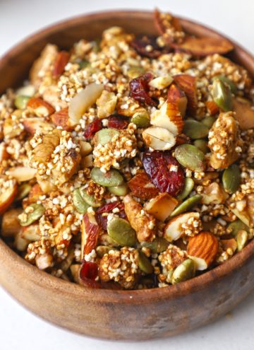 side close up shot of amaranth granola in a bowl.