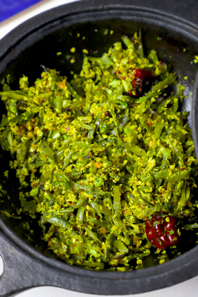 side close up shot of avarakkai poriyal in a kadhai.