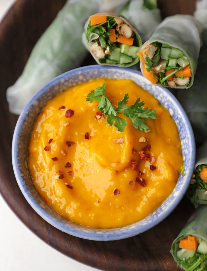 aerial shot of Thai mango chilli sauce in a blue ceramic bowl.