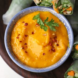 aerial shot of Thai mango chilli sauce in a blue ceramic bowl.