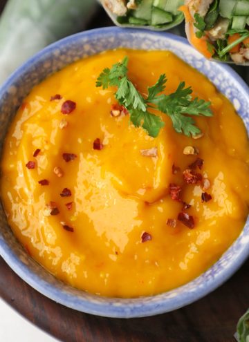 aerial shot of Thai mango chilli sauce in a blue ceramic bowl.