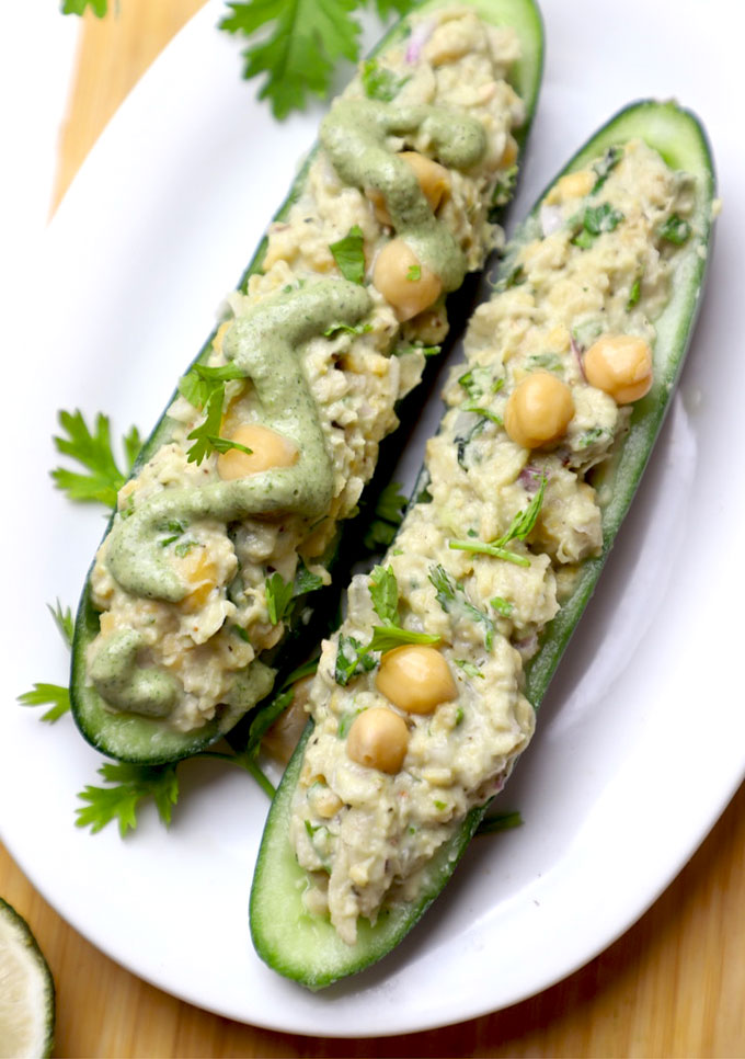 side shot of high protein cucumber boats served on a white platter.