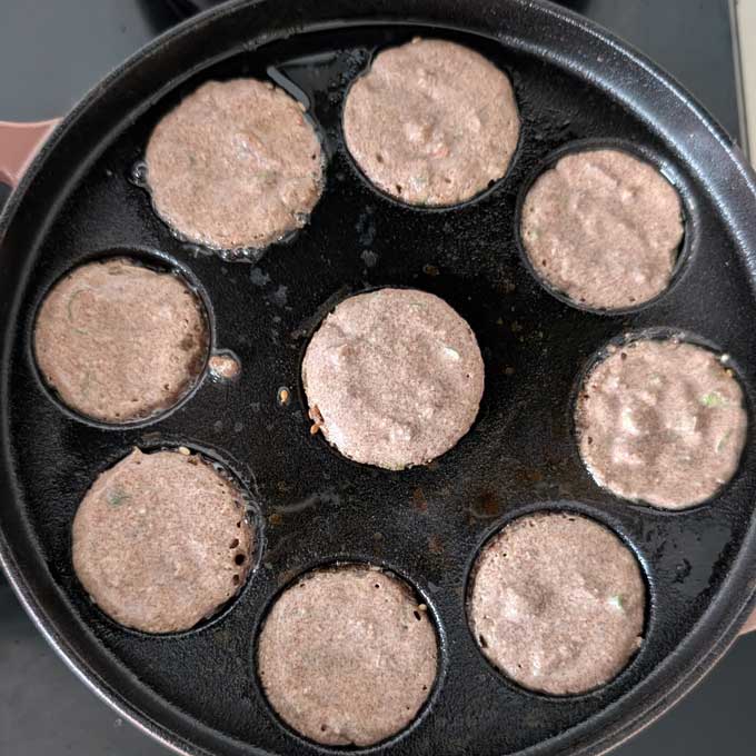 making ragi appe in paniyaram pan
